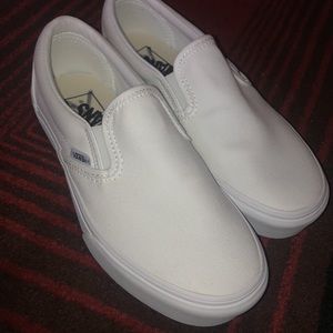 White platform slip on vans